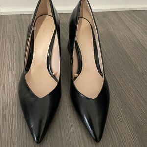 Black pump with large heel